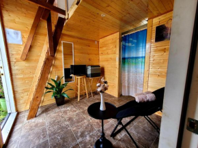 Tiny house with kitchen equipped with essentials near at the Volcano Park